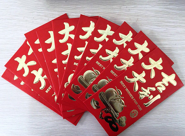 Each employee was received a red envelop on the first work day after Chinese New Year