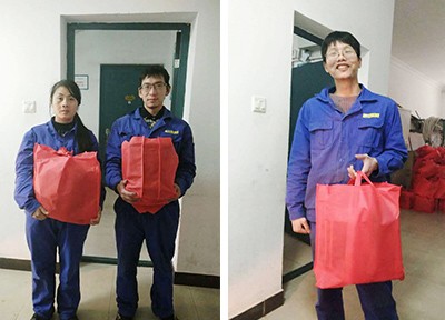 Each employee was received a large bag as New Year Gift